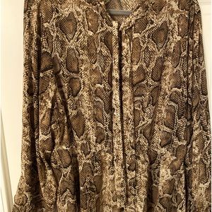 Peplum snake skin patterned blouse